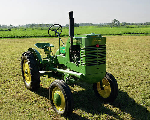 Wall Art featuring the photograph Jorn Deere Model 36 Tractor by Flees Photos