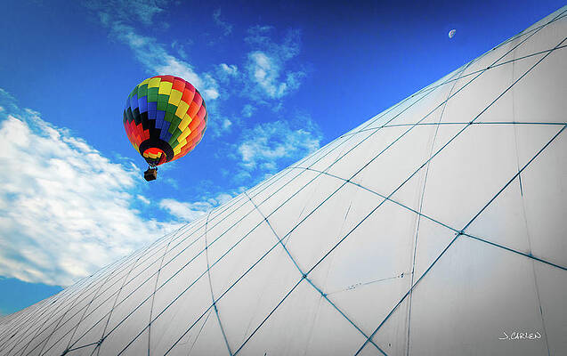 Sky Wall Art featuring the photograph Just Passing By by Jim Carlen