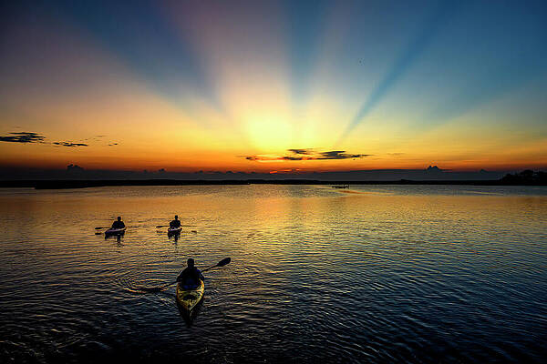 Nature Photograph - Kayaking Into The Sunset by Anthony Hightower