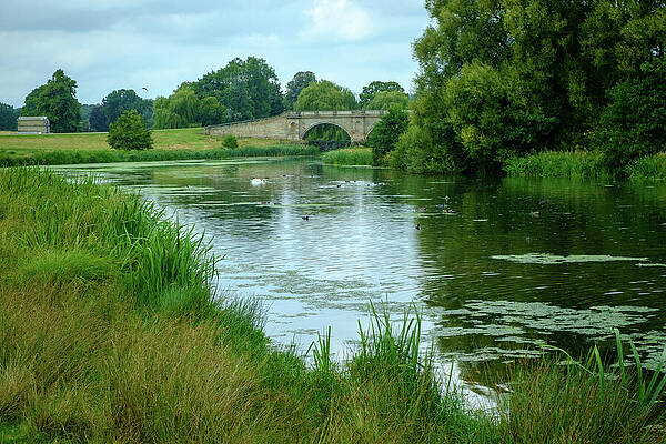 Tranquil River and Stone Bridge Photograph