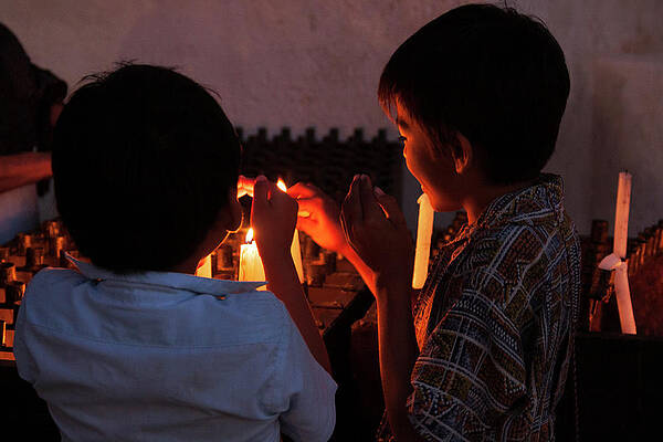 Wall Art featuring the photograph Kids Lighting Candles On Easter Day, Mexico by Tatiana Travelways