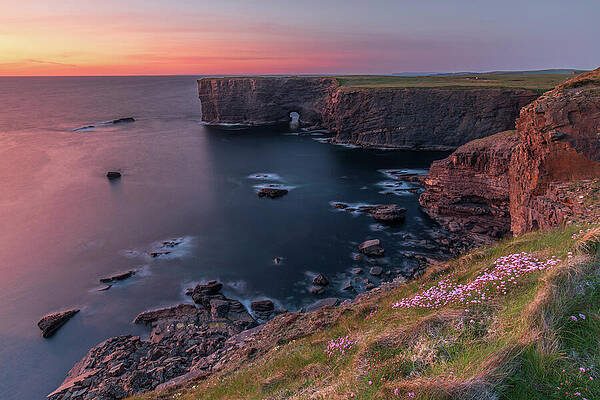 Sunset Photograph - Kilkee Cliffs And Sea Arch, Co Clare by Adrian Hendroff