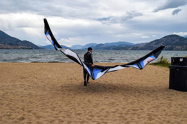 Beach Photograph - Kitesurfer On Sudbury Beach by Tom Cochran
