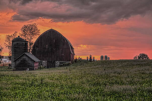 Spring Photograph - Late Spring Storm Over The Old Barn by Dale Kauzlaric