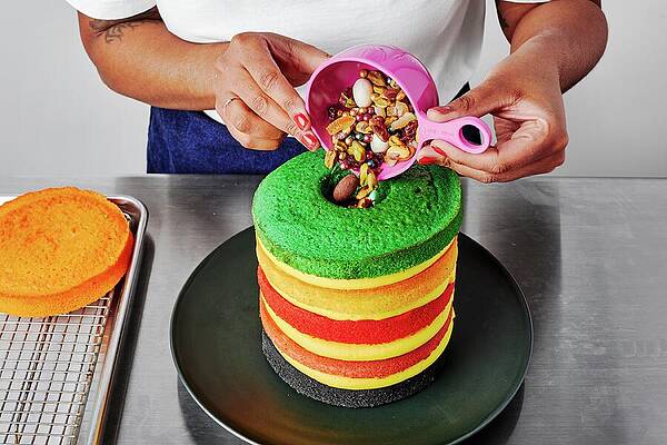 Baking Wall Art featuring the photograph Layer Cake With A Core Of Sprinkles by Laura Murray