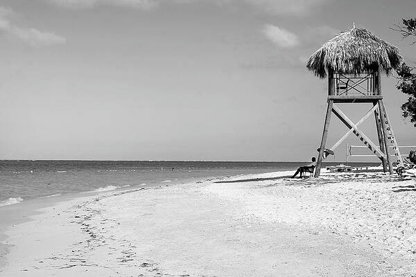 Black And White Photograph - Lifeguard Chillaxing by Gina Cinardo