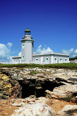 Coastal Lighthouse Against Blue Sky Wall Art