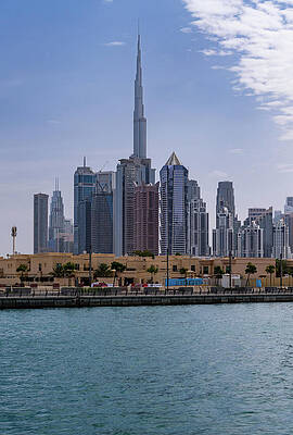Modern Wall Art featuring the photograph Low Rise Homes In Front Of Modern Apartments Of Dubai Downtown D by Steven Heap