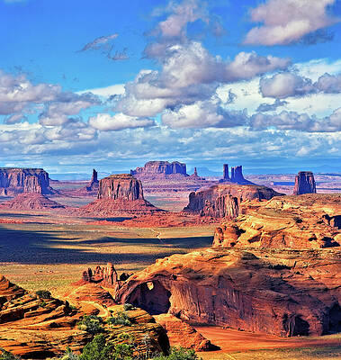 Majestic Monument Valley  and Clouds by Bob Falcone