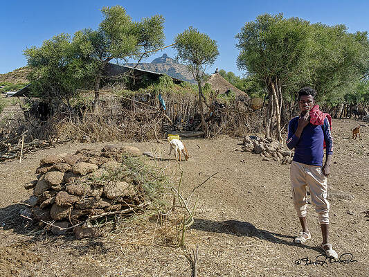 Sky Photograph - Man Standing In A Traditional Lalibela Village by Steven Dos Remedios