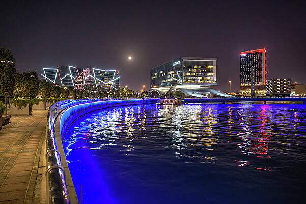 Wall Art featuring the photograph Manama Bahrain Bay Skyline At Night With Arcapita And Hilton Garden Inn by Miroslav Liska