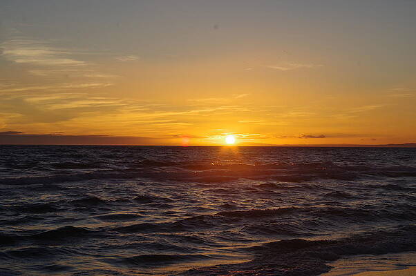 Wave Photograph - Marbella Sunset Across Waves by Murray Croft