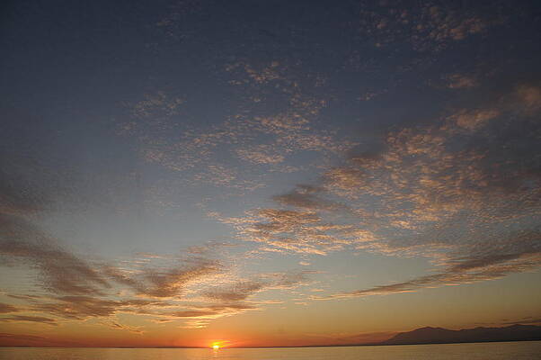 Wave Photograph - Marbella Sunset With Perfect Clouds by Murray Croft