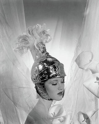 Contrast Wall Art featuring the photograph Mary Taylor Wearing A Roman Helmet by Cecil Beaton