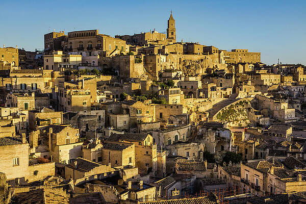 Dramatic Wall Art featuring the photograph Matera In The Morning Sun by Elvira Peretsman