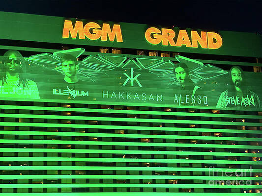 Wall Art featuring the photograph MGM Grand Hotel In Las Vegas Lit Up At Night by FeelingVegas Wall Art and Prints