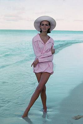 Woman in Pink by the Shore Wall Art