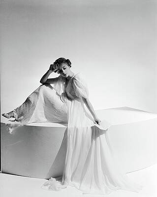Minimalist Wall Art featuring the photograph Model On Platform In Pleated Gown by Cecil Beaton