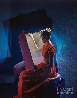 Elegant Wall Art featuring the photograph Model Reading A Large Folio by Cecil Beaton