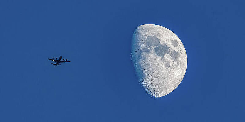 City Wall Art featuring the photograph Moon Flight by Tommy Farnsworth