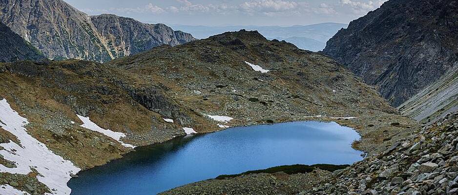 Mountain Lake Surrounded by Peaks Photograph