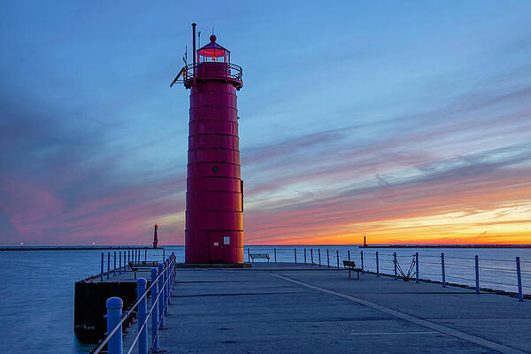 Sunset Wall Art featuring the photograph Muskegon South Pier Light And South Breakwater Light At Dusk by Michael Collins