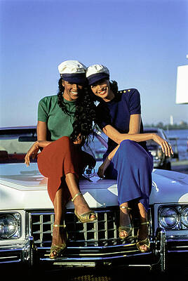 Stylish Friends on a Classic Car Photograph