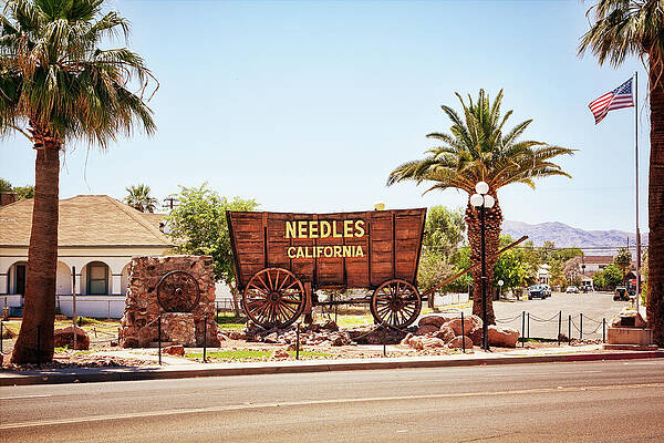 Wall Art featuring the photograph Needles, Welcome Wagon Sign, California by Tatiana Travelways