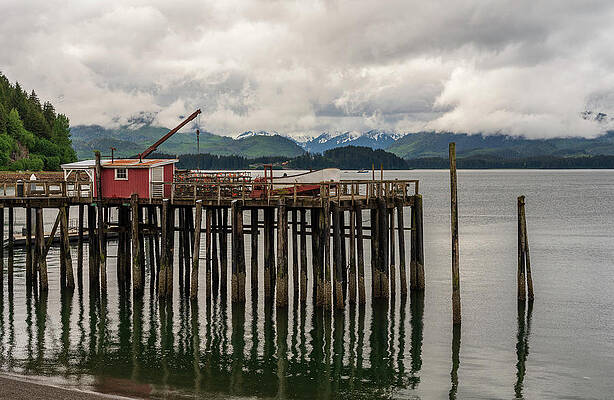 Wall Art featuring the photograph Old Wooden Pier Structure In Bay At Icy Strait Point In Alaska by Steven Heap