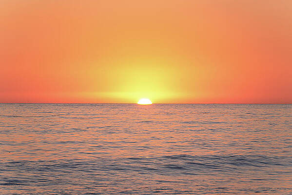 Wall Art featuring the photograph Orange Sunset Over The Ocean by Matthew DeGrushe
