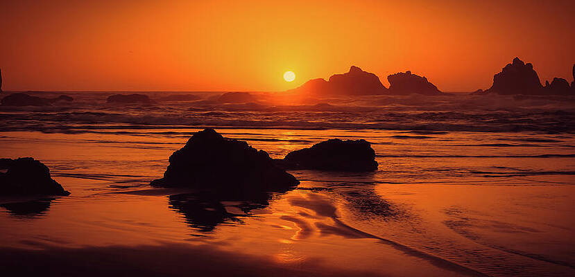 Sunset Over Rocky Shoreline Wall Art