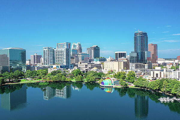 Color Image Wall Art featuring the photograph Orlando Skyline Reflection by Michael Warren