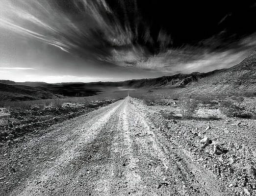Sky Wall Art featuring the photograph Out There At The End Of This Road by Joe Schofield