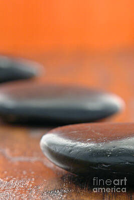 Wall Art featuring the photograph Polished Hot Massage Stones In A Warm Spa by Olivier Le Queinec
