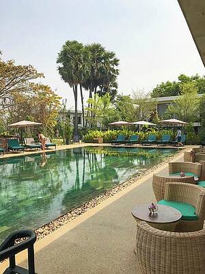 Wall Art featuring the photograph Poolside In Cambodia by Rebecca Herranen