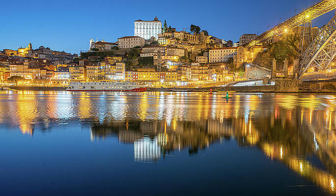 Reflection Photograph - Porto, Portugal Bridge And City Light Reflections by Michael Warren