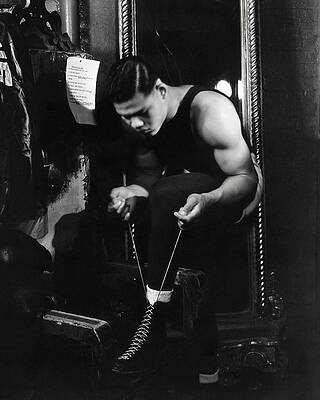 Bodybuilder Lacing Up Shoes Wall Art