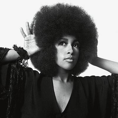 Woman with Afro and Playful Gesture Wall Art