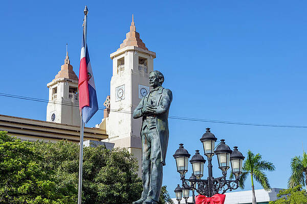 Statue Near Twin Clock Towers Wall Art