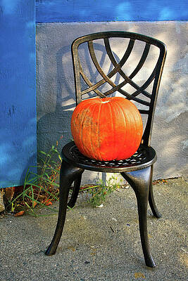 Pumpkin on a Metal Chair Wall Art
