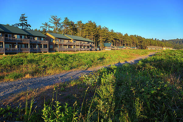 Wall Art featuring the photograph Quileute Oceanside Resort On La Push Beach With Lodges Among Trees At Sunset by Miroslav Liska