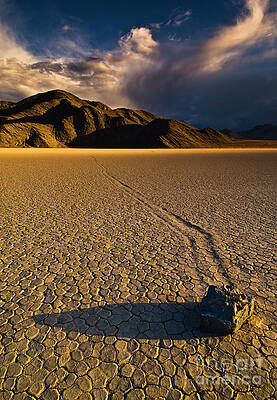 Dramatic Photograph - Racetrack Playa Sliding Rock, Death Valley, California by Neale And Judith Clark