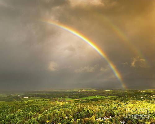 Dramatic Wall Art featuring the photograph Rainbow Over Middlebury Vermont by Eric Killorin
