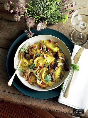 Plate Wall Art featuring the photograph Ravioli With Artichokes And Almonds by Riccardo Lettieri