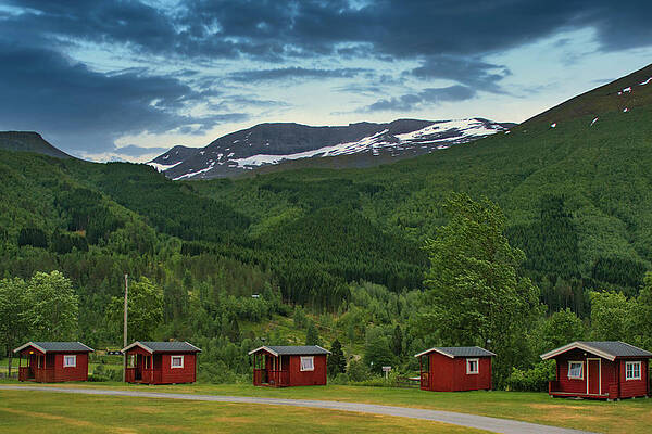 Wall Art featuring the photograph Red Cabins In The Mountains Of Norway by Matthew DeGrushe