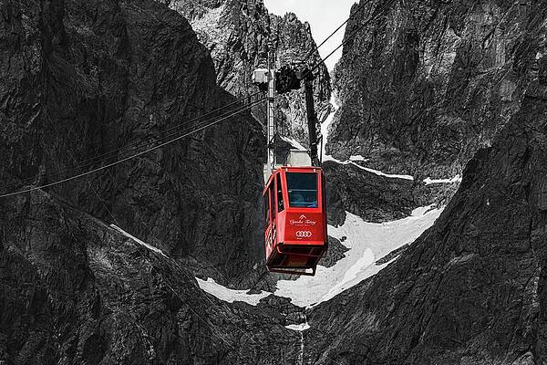 Red Cable Car in Mountain Pass Photograph