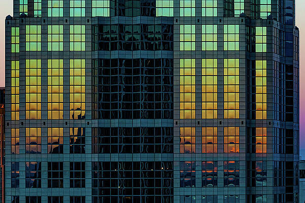 City Wall Art featuring the photograph Reflected Sunset by Tommy Farnsworth