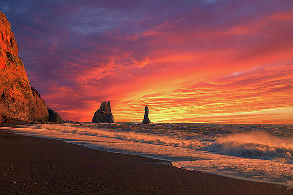Sunset Photograph - Reynisfjara, Iceland At Sunset by John Twynam