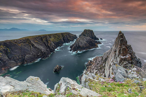 Sunset Photograph - Rock Formations At Malin Head, Co Donegal, Ireland by Adrian Hendroff
