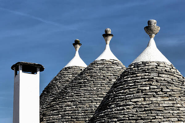 Bold Wall Art featuring the photograph Roofs Of Trulli Houses by Elvira Peretsman